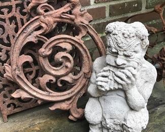 Antique French iron scrollwork and vintage Pan figure 