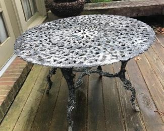 Vintage iron garden table with a wonderful old patina...seats four
