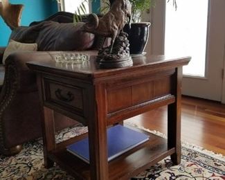 One of two matching end tables