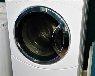 GE front load washing machine with base