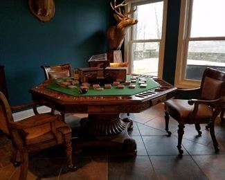 Poker table with and five chairs with leather seats and backs