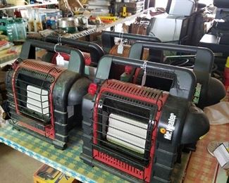 Several Mr. Heater propane heaters