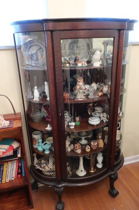 vintage oak curio cabinet 61" tall x 54" wide, 395.00 and can be purchased prior to the sale