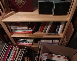 shelves,   books,  more  records(some  classical  in  the  basement ) 