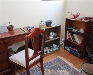 desk  and  chair,  books,  bookcases