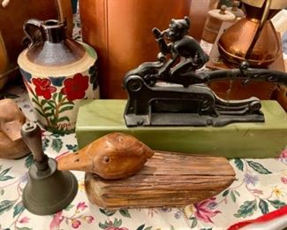 pottery jug, brass bell, cast iron elf nut cracker