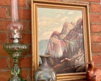 close-up of artwork and oil lamps