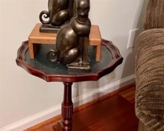 pair of pot metal cat bookends, small side table