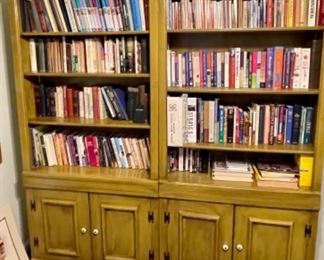 pair of "antiqued" solid wood bookcases, lots of books