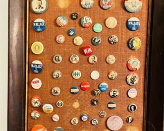 Framed collection of political buttons