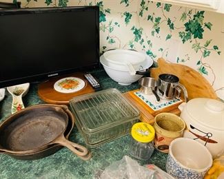 cast iron skillets, refrigerator dish, crocks,