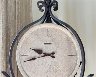 stone face Howard Miller tall clock