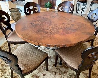 5 ft. round copper-top table with 6 chairs 