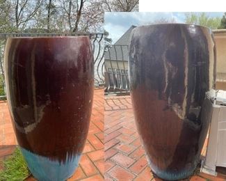 Heavy, approx 40” tall matching planters. Burgundy & blue 