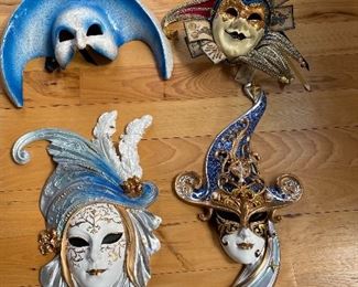 Decorative masks, top row- wearable jester masks.....upper left is Cirque du Soleil
Bottom two- wall hangings 