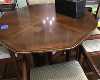 Great game table with four rolling chairs