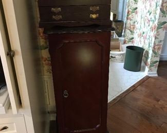Jewelry cabinet that was full of costume jewelry 