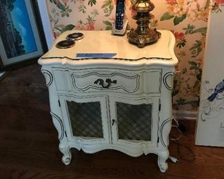 One of two French style bedside tables