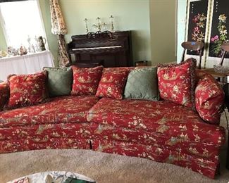 Elegant curved sofa with beautiful upholstery.