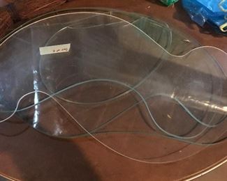 Glass cut out made to resemble golf greens.  Used as the basis for flower designs.