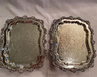 Lot#36 $70 Pair small rectangular footed silver plated trays. One showing some copper. Both 14" x 11"