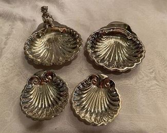 #59 $12 - 4 small silver plated shell dishes 3-1/4"-5-1/2" w