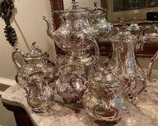 #89 - $350 - 6 piece tea set with tipping teapot. Hand chased Folgate made in England 