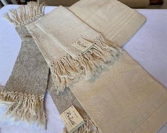 Lot#534 $75 -6 Busatti towels-4 hand, 2 large hand towels 