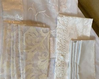 Lot#544 $32-polysatin and sheer tablecloth 54"sq, 6 napkins and 32"sq tablecloth with 4 napkins