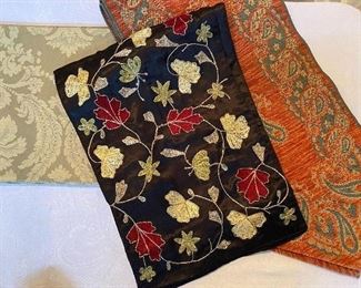 Lot#585 $42-6 placemats, chenille runner, embroidered runner