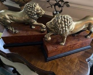 Lot#713 $95 Pair of lion bookends on burl bases