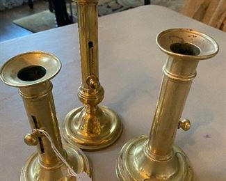 Lot#670 $45 Lot of 3 brass pushup candlesticks