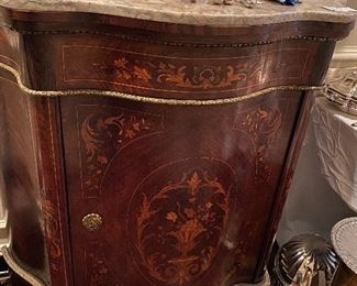 Lot #162 $1600 Cabinet in bathroom hall Italian marble top, serpentine front, marquetry and French ormolu. 43-1/2"H x 41"W x 17-1/2"D