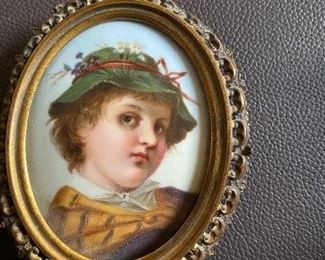 Lot#185 $125-small oval porcelain painting of boy