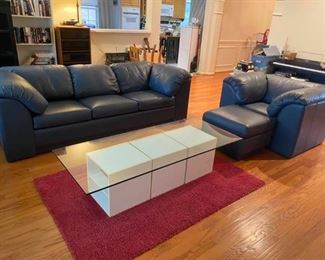 Blue Leather Sofa Set
Excellent condition! 
Includes couch, chair & ottoman.
Couch measures: 94” long x 34” deep x 17” tall to seat, 28” tall to back.
Chair measures: 46” x 34” deep x 17” tall to seat, 28” tall to back.
Ottoman measures: 22” x 25” x 17” tall. 
Must be able to move and load yourself