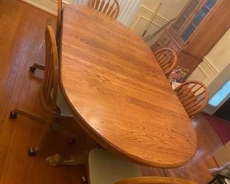 Vintage Clawfoot Table & 6 Rolling Chairs
Excellent condition! 
Each chair measures: 18” tall to seat x 37” tall to back, 17” deep x 17” across. 
Table measures: 4’ x 47” across x 29” tall (there are 4 leaves, each leaf adds an extra 1’ of length) 
Must be able to move & load yourself.