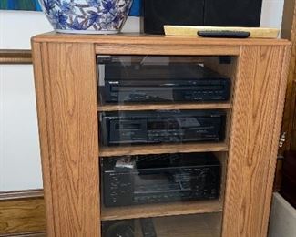 Onkyo Stereo with Oak Cabinet that has CD storage in hidden door.