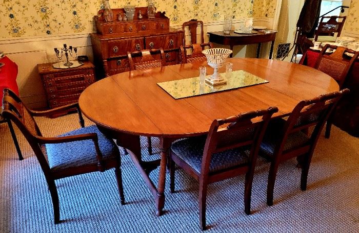 Wonderful cherry drop leaf table...a set of 10 vintage dining chairs.
