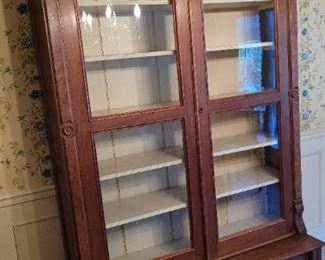 Large lighted early American cupboard