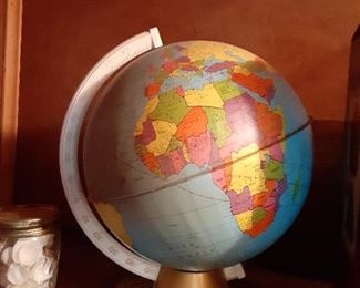 T i n litho world globe with astrological signs on the bottom base