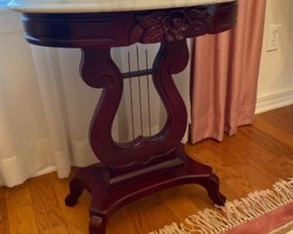 3-	$150  Oval lyre table 22” x 18” x 25”