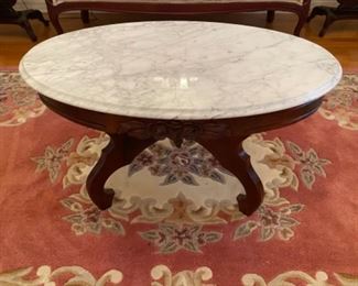10- $150	Victorian style marble top oval table 			
34”L x 22”D x 17”H 
