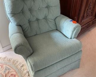 26- $50 Turquoise swivel chair 	