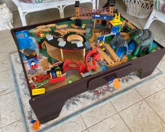 38-$60 Imaginarium table with items