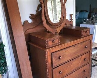Late 1800's three quarter walnut bed with headboard, foot board, rails and dresser with glove drawers swivel mirror.. beautiful