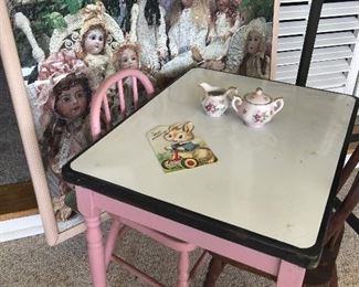 Antique Child's enamel top table and two comb back chairs