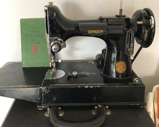 Antique 221-1 Singer Sewing Machine w/ case and attachments. Very good condition!