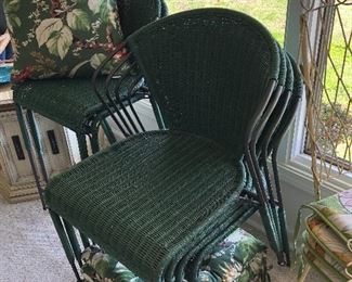 Group of 4 Stacking rattan chairs -cushions. Plus two tall bar chairs (same pattern)