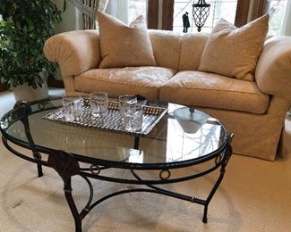 Custom upholstery by Jack Lenore Larson - loveseat with down cushions - 78" long, 

oval glass and metal coffee table - sold