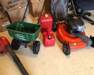 fertilizer spreader, leaf blower, and mulching mower